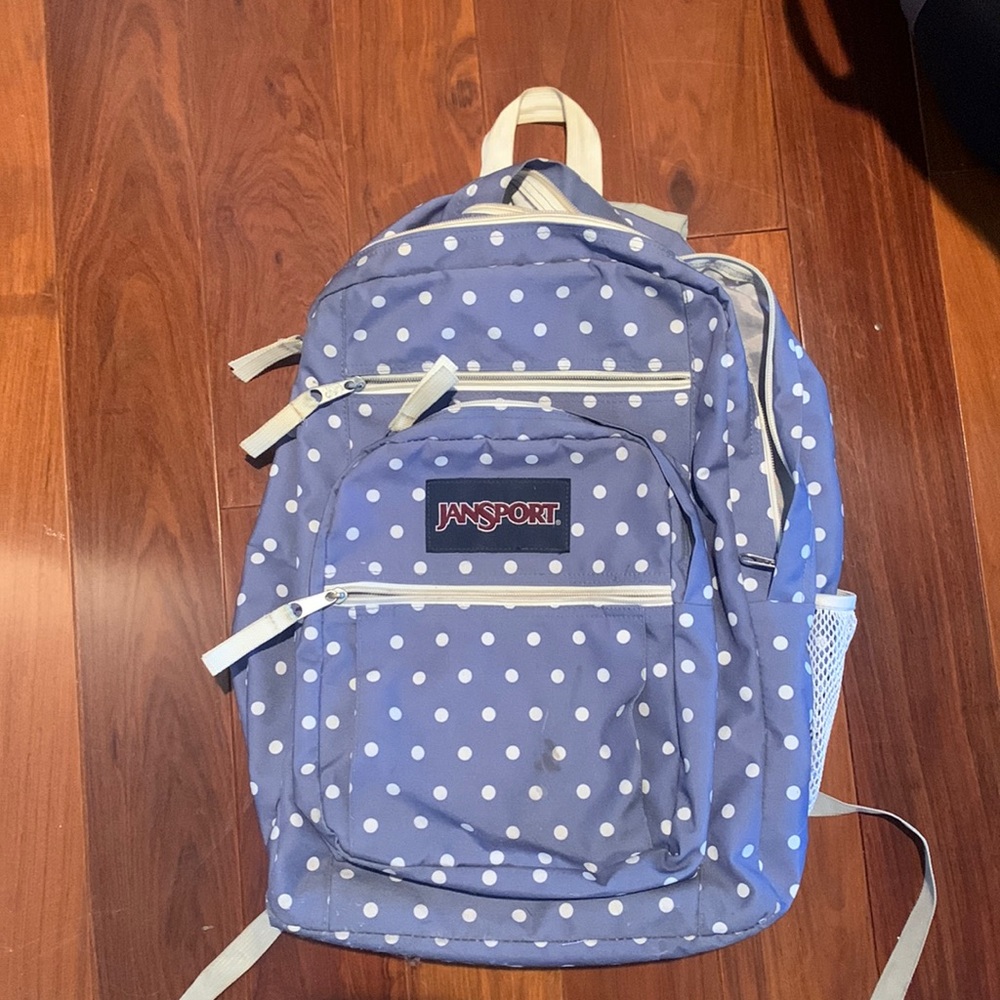 Jansport Big Student backpack; light purple with white polka dots